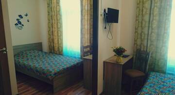 Фото номера  Двухместный номер Делюкс с 1 кроватью Гостиница Guest house in Otradnoye г. Отрадное 48